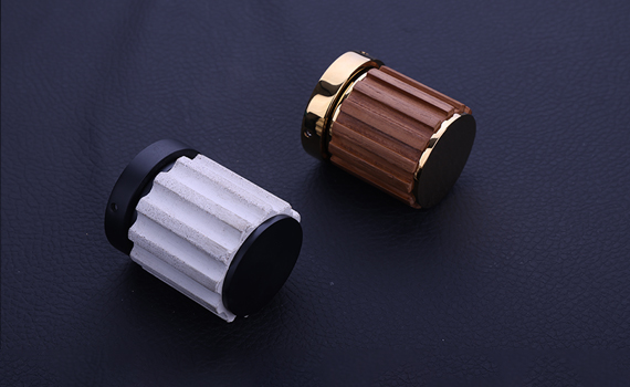 Custom handcrafted brass cabinet pull and door fitting from Atcraft bespoke series