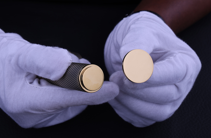 Bespoke solid brass door handle with custom knurled texture finish by Atcraft