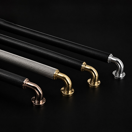 Narow designer door pull handle from the Atcraft Aura Collection