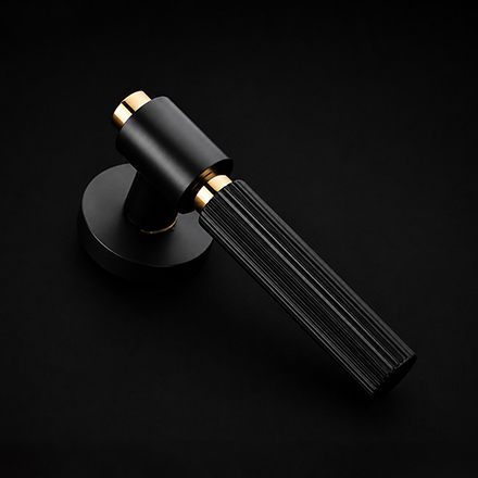 Colon designer rose handle on rosette from the Atcraft Aura Collection