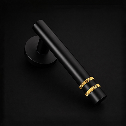 Cosa designer rose handle on rosette from the Atcraft Aura Collection