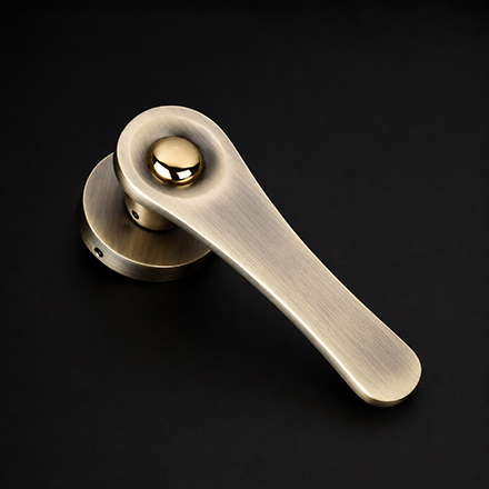 Dew designer rose handle on rosette from the Atcraft Aura Collection
