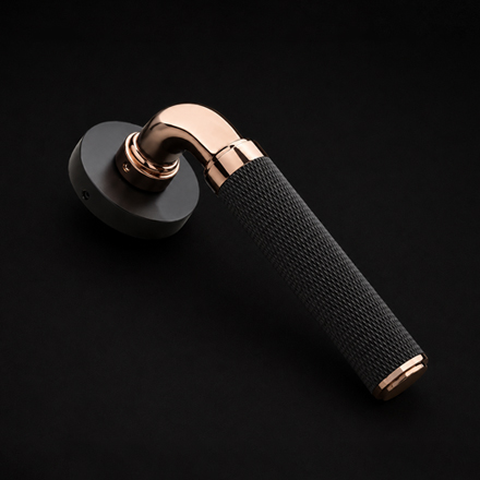 Narow designer rose handle on rosette from the Atcraft Aura Collection