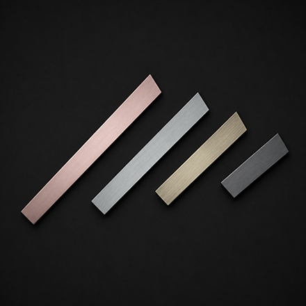 Dark textured cabinet handle with polished brass end mounts