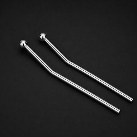 Dark textured cabinet pull handle with polished brass end mounts