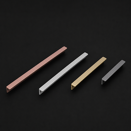 Dark textured cabinet handle with polished brass end mounts