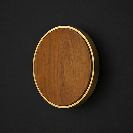 Dark textured pull handle with polished brass end brackets