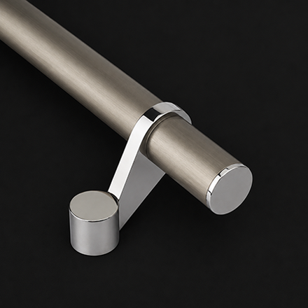 Dark textured pull handle with polished brass end mounts