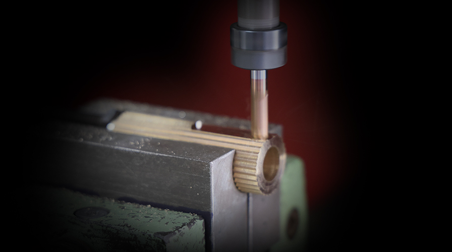 Precision CNC machining of luxury brass door handles at the Atcraft manufacturing facility